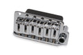 Chrome metal guitar tremolo bridge with six steel saddles and mounting holes on a white background.