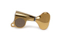 Single gold guitar tuning machine head with oval tuning knob and mounting hole.