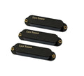 Three black Lace Sensor single coil pickups with gold mounting holes and logo text.