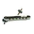 Silver metal guitar bridge with six adjustable saddles and a separate threaded post on white background.