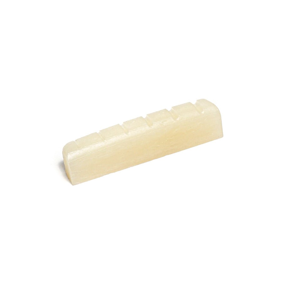 Off-white bone guitar nut with six string slots shown on a white background.
