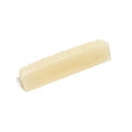 Off-white bone guitar nut with six slotted grooves for strings shown against a white background.