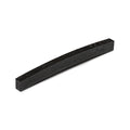 One curved black rectangular piece made of carbon or similar material on a white background.