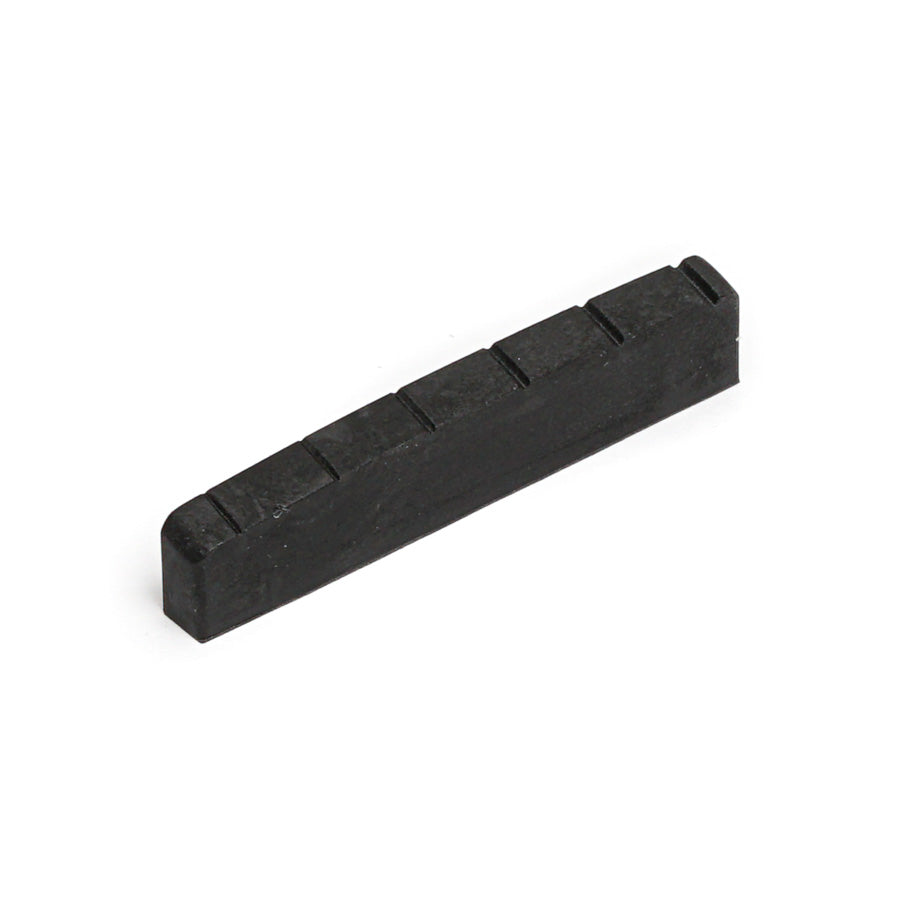 Black rectangular guitar nut with six string slots on a white background.