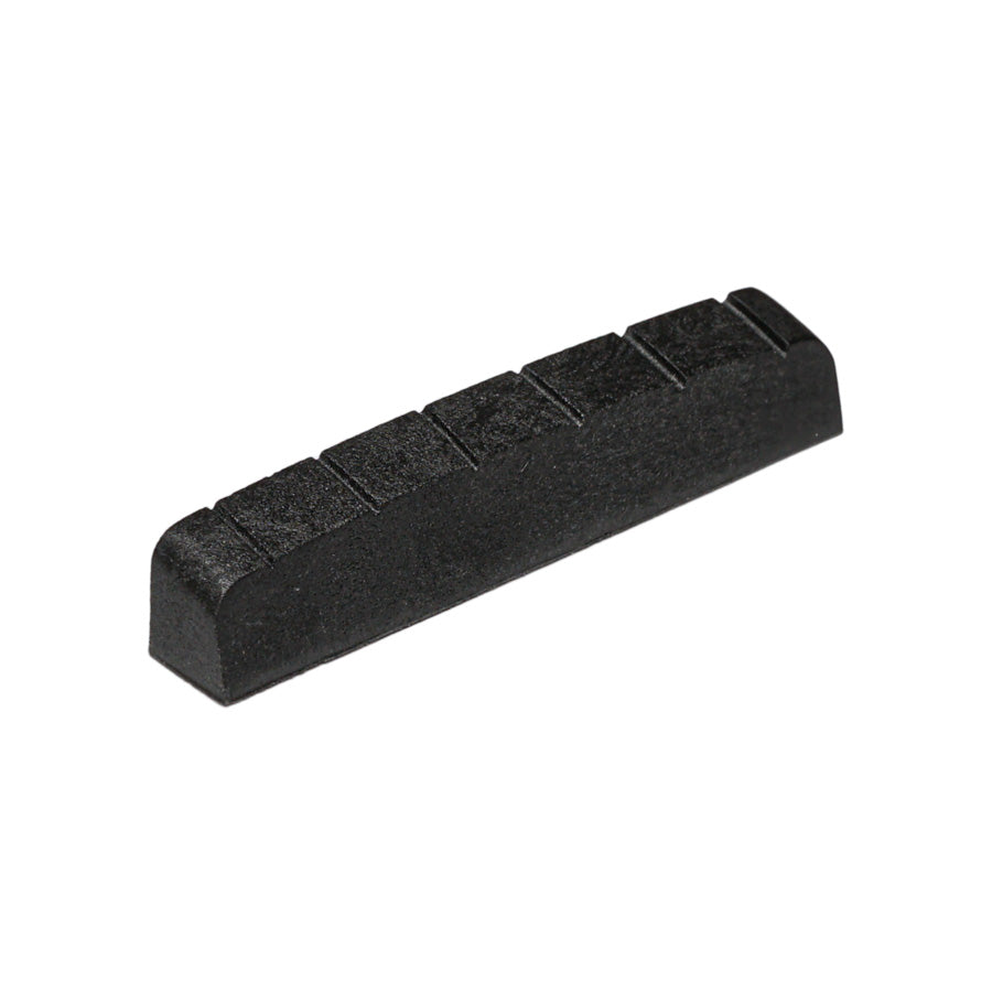 A small black guitar nut with six string slots visible, isolated on a white background.
