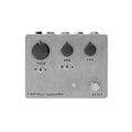 Gray rectangular audio effects pedal with three knobs, two toggle switches, one footswitch, and four jacks on top.