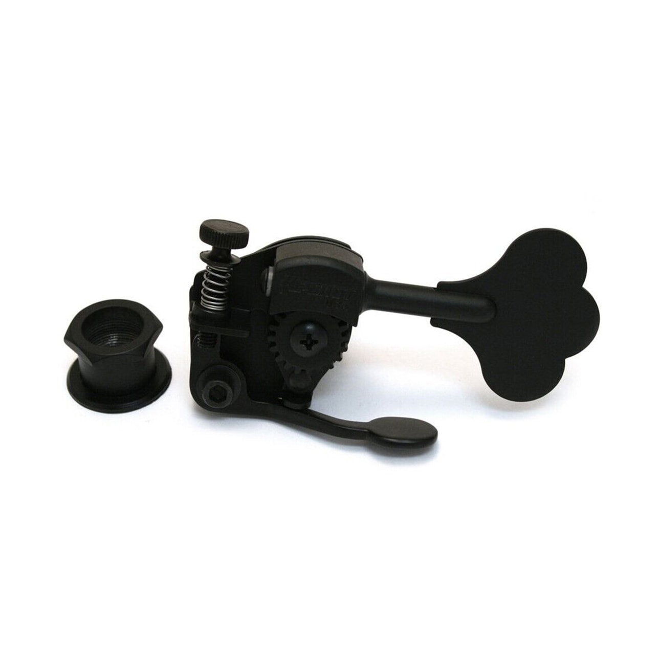Black clover-shaped bass guitar tuner with adjustment knob and separate threaded nut.