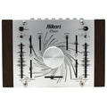 Top view of Hikari Duos synthesizer with multiple knobs, sliders, and switches on a silver metal panel with wooden sides.