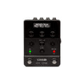 Front view of a black Line 6 HX One multi-effects pedal showing knobs, buttons, footswitches, and a screen with effect settings.