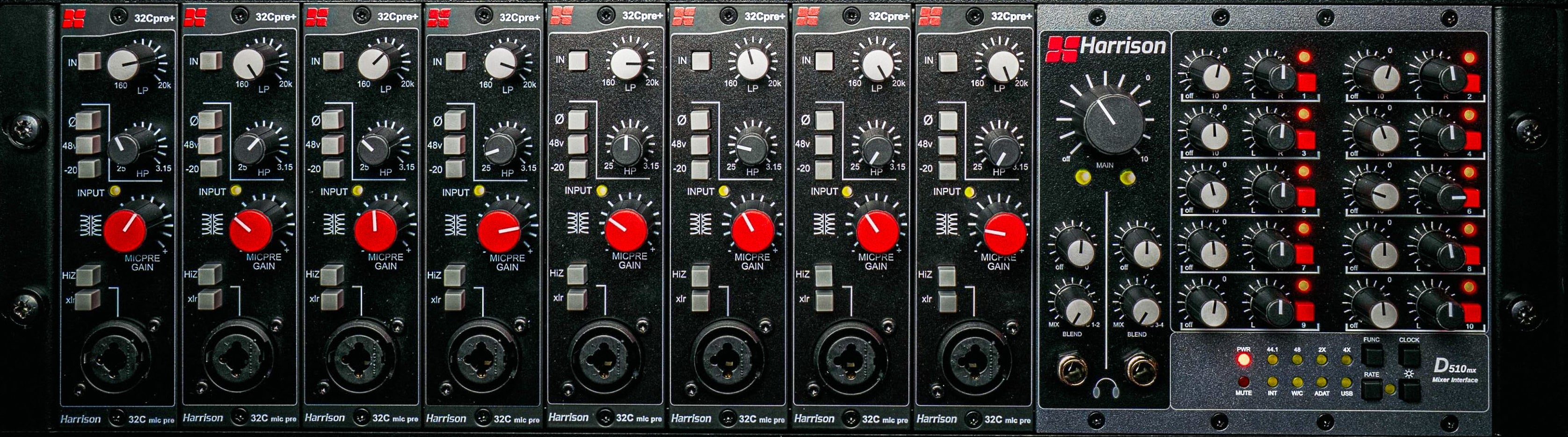 Front view of a Harrison audio 500 series chassis with eight 32C preamp modules and a D510mx mixer interface.