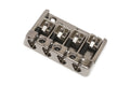 Silver metal bass bridge with four saddles and adjustment screws on a white background.
