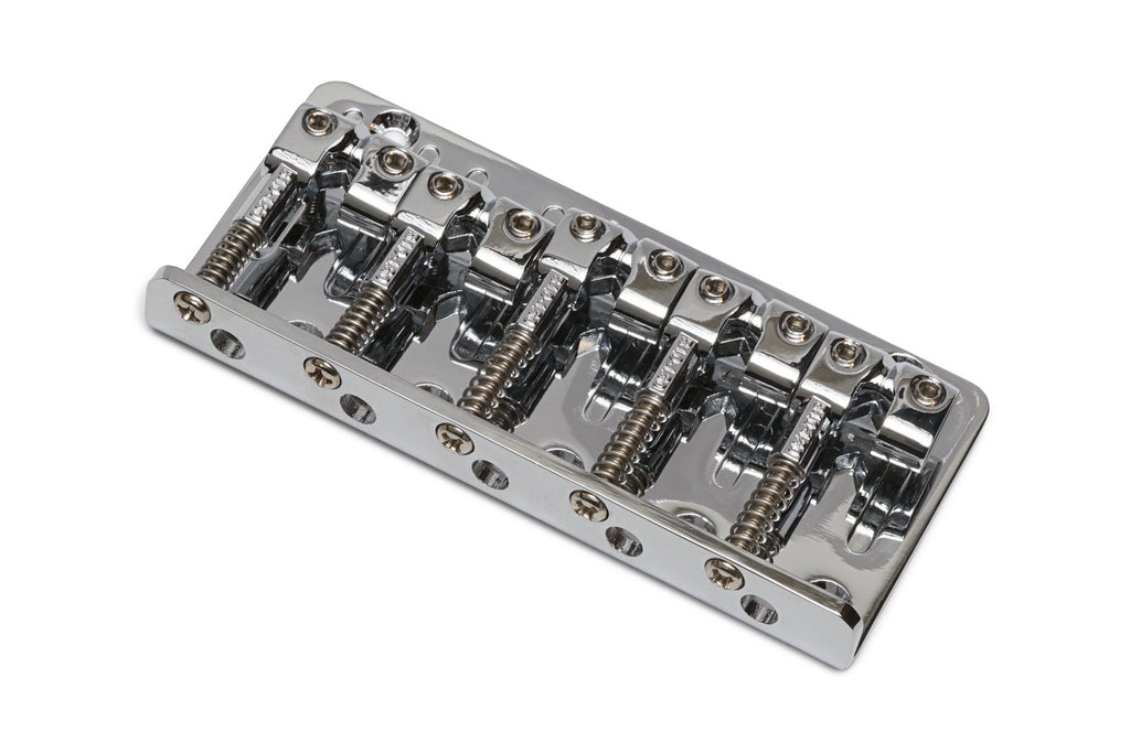 Chrome metal bridge component with five string saddles and adjustment screws for a stringed instrument.