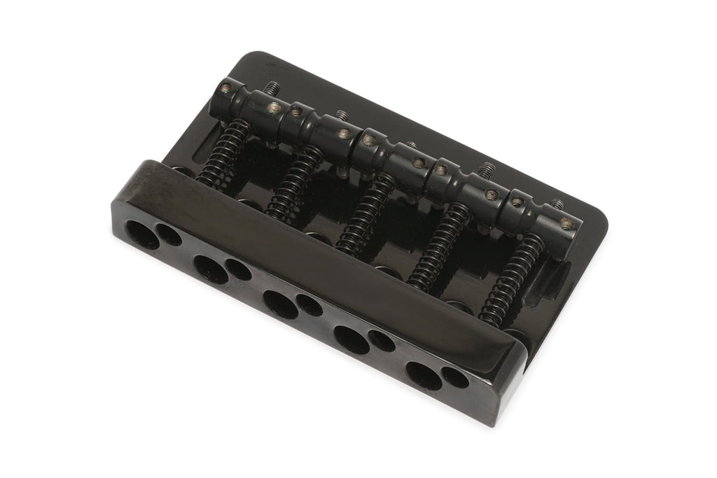 Black metal guitar or bass bridge with five string saddles and adjustment springs.