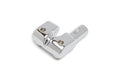 Chrome metal guitar bass saddle part with two screws and Ibanez branding.