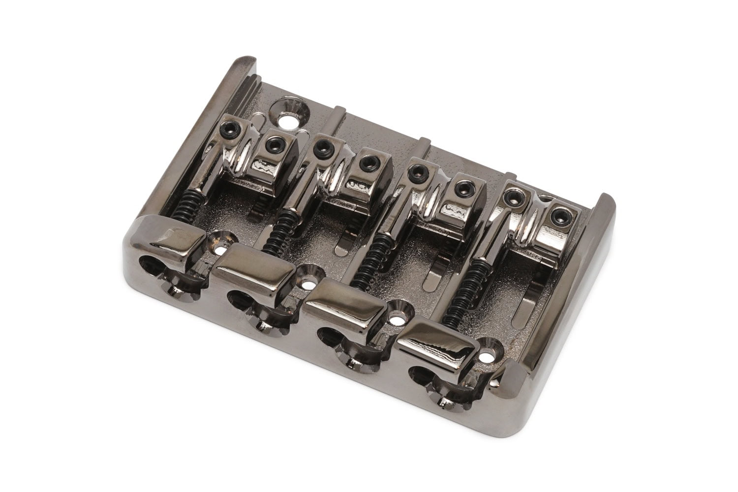 Metal guitar bridge with four string saddles and adjustment screws shown from an angled top view.