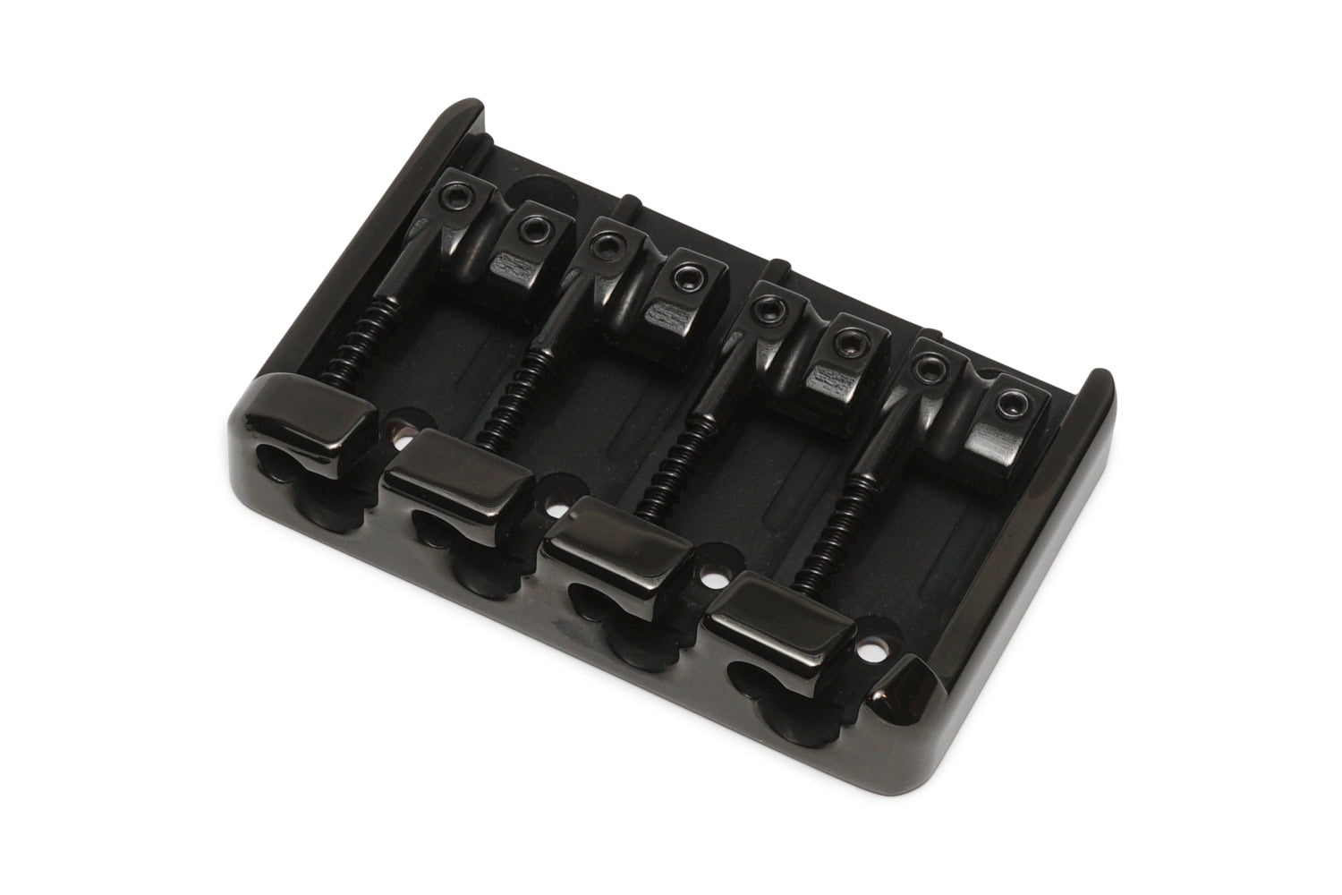 Black metal guitar bridge with four adjustable saddles on a white background.