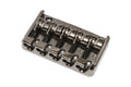 Cosmo black metal bridge with five saddles for a bass guitar shown from an angled top view.