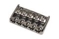 Chrome metal bridge for a 5-string bass guitar with individual adjustable saddles.