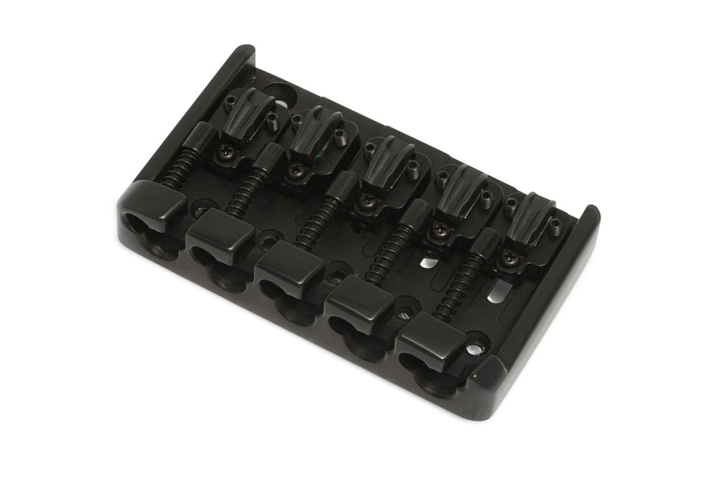 Black metal 5-string bass guitar bridge with individual string saddles and adjustment screws.