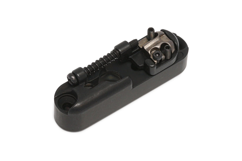 Flat black mono-rail single string bass bridge component with screws on white background.