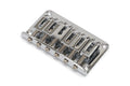 Chrome metal guitar bridge with six adjustable saddles and Ibanez logo visible