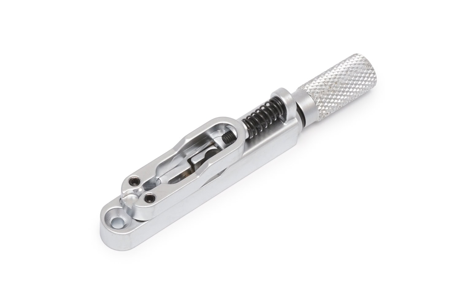 Close-up image of a silver metal guitar bridge with a knurled adjustment knob and mounting holes on a white background.