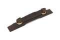 Ebony-colored guitar bridge with gold adjustment knobs on a white background