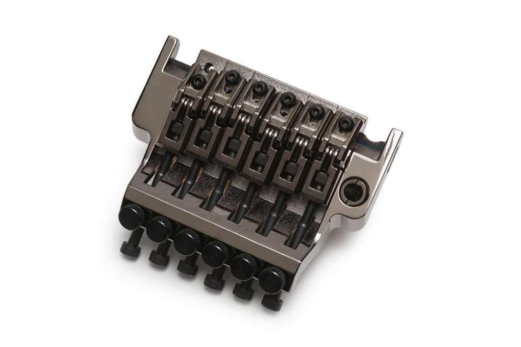 Black and metallic 6-string tremolo bridge for guitar with adjustment knobs and screw mounts