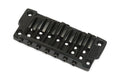 Black metal fixed guitar bridge with seven string saddles and screw adjustments.