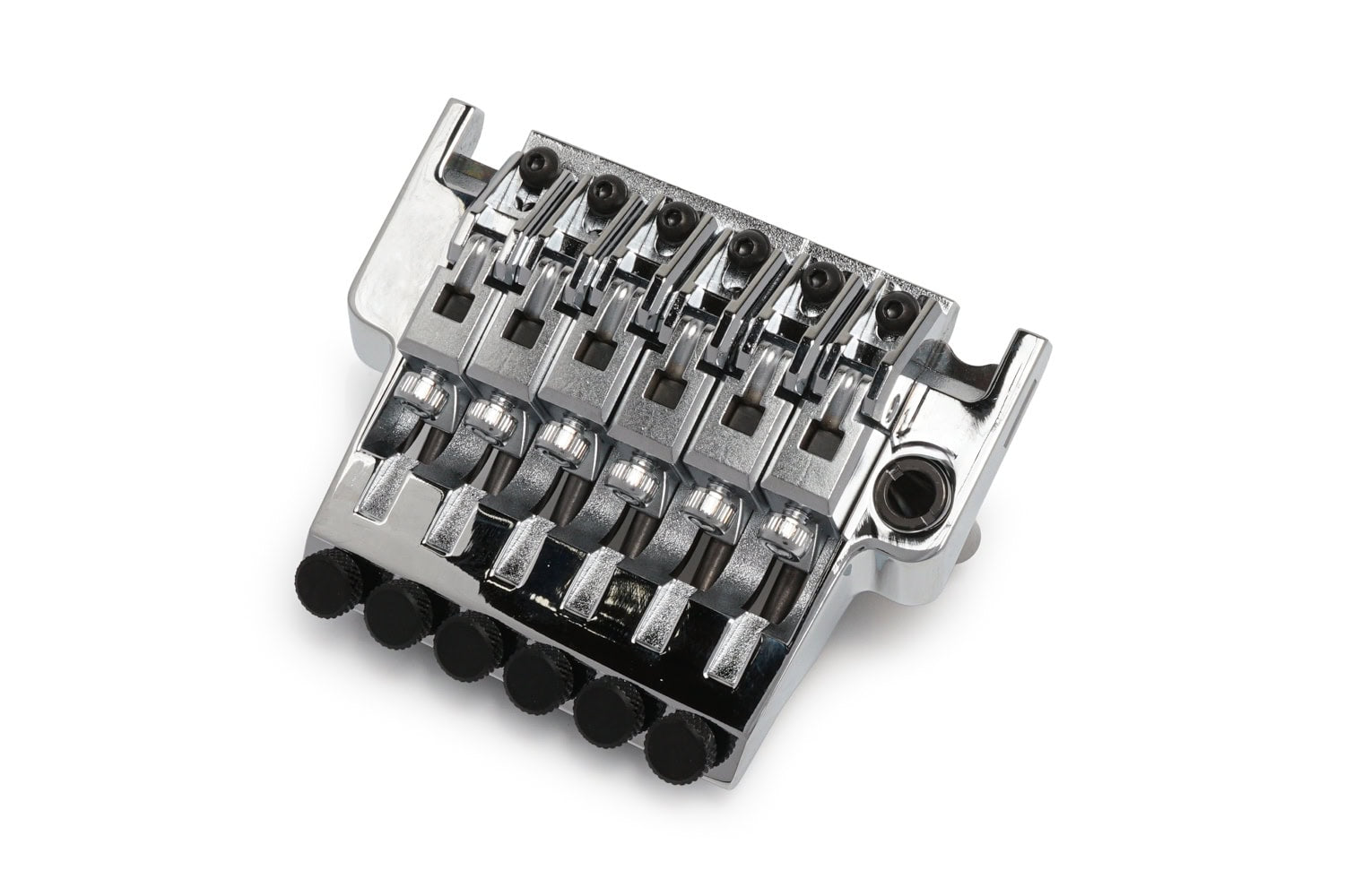 Chrome six-string guitar bridge with adjustable saddles and black screw knobs on white background
