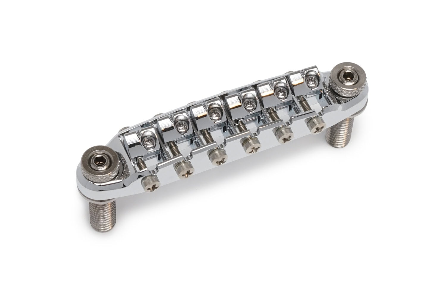 Chrome metal guitar bridge with six adjustable saddles and two threaded mounting posts.