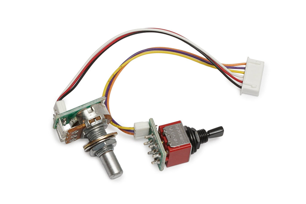 Electronic control assembly with a rotary potentiometer, toggle switch, and multi-colored wires with connectors.