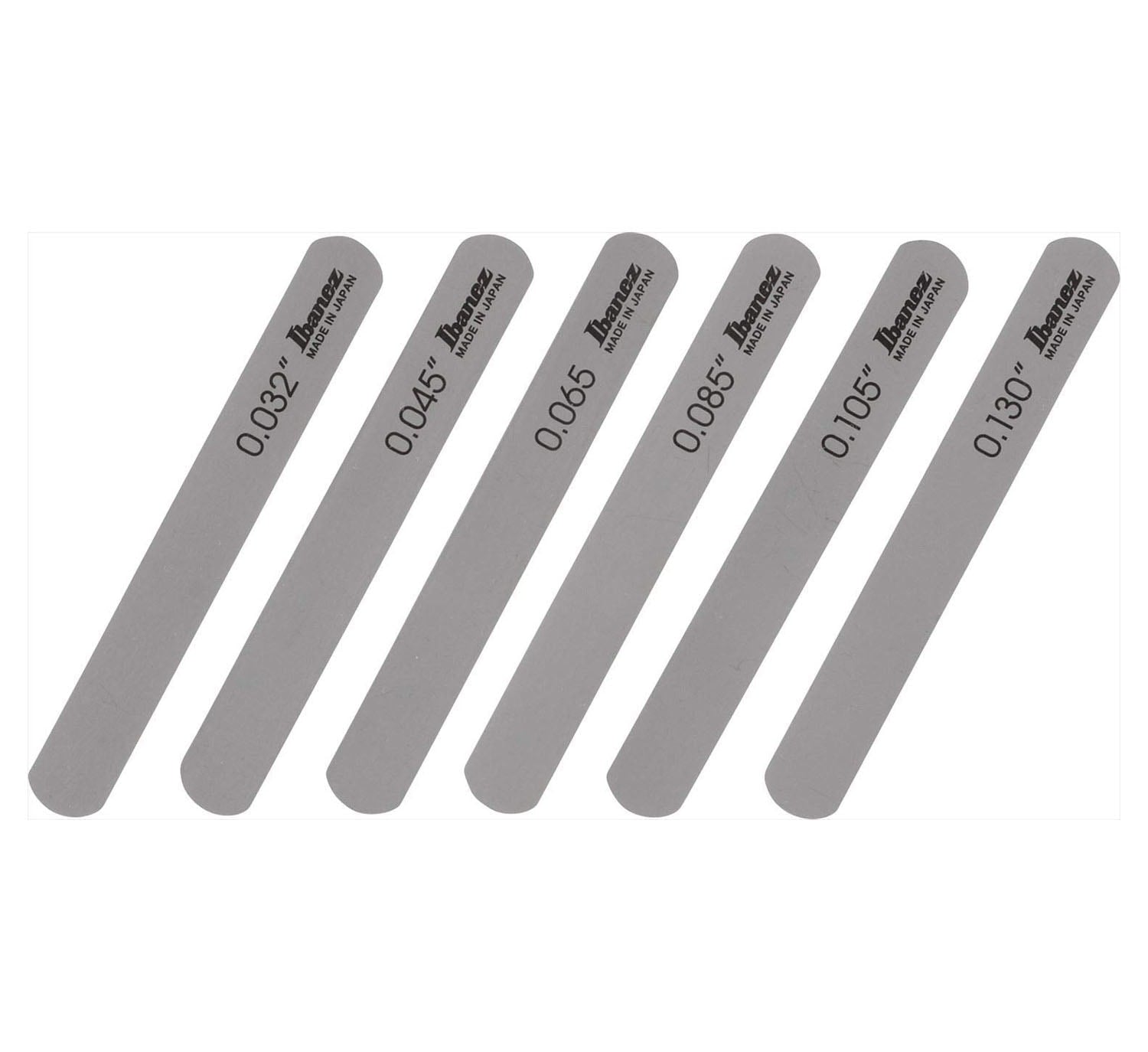 Six gray metal files labeled with thickness measurements and Ibanez branding laid out side by side.