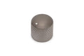Small metal knurled knob with a smooth top and a single indicator dot on a white background.