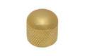 Gold-colored metal knurled knob with a smooth rounded top.