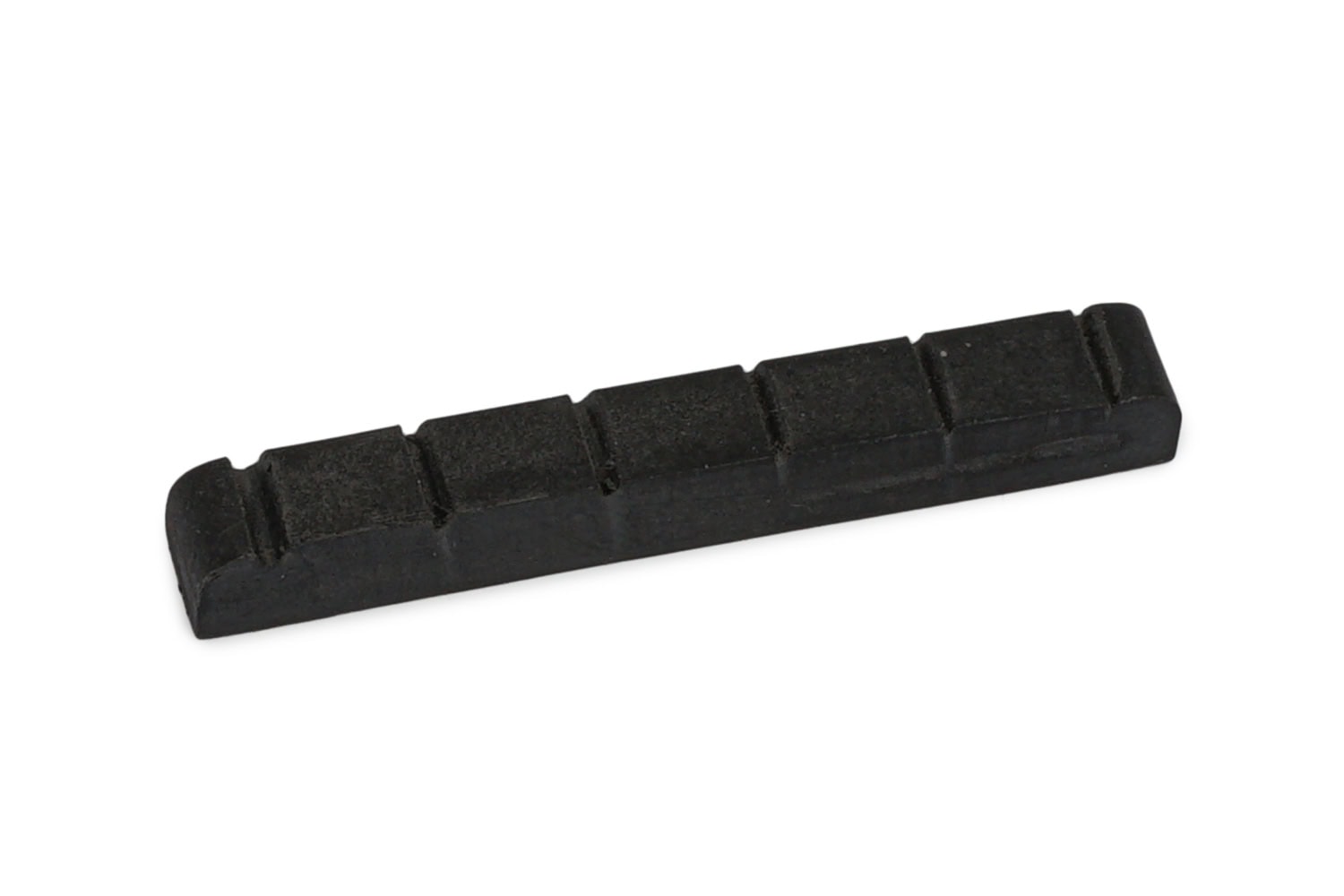 Small black guitar nut with six string slots, shown on white background.