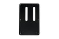 Black rectangular guitar tremolo backplate with six mounting holes and two oval cutouts.