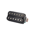 Black humbucker-style electric guitar pickup with metal pole pieces and attached multi-conductor wires.