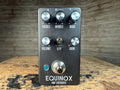 Black Equinox Amp Overdrive pedal with six knobs, a toggle switch, a footswitch, and a blue indicator light.
