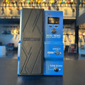 Blue and black BOSS XS-100 Poly Shifter guitar effects pedal with buttons, knob, and foot pedal.