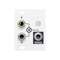 White module panel with three 3.5mm jacks labeled X, Y, and RING and a small round light or indicator.