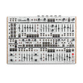 Top view of Intellijel Cascadia synthesizer module with multiple knobs, faders, buttons, and 1/8 inch audio and MIDI ports