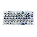 Two connected eurorack module panels with multiple knobs and 3.5mm audio jacks labeled for audio mixing and expansion.