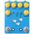 Blue guitar effects pedal with yellow knobs, three toggle switches, two footswitches, and paper airplane graphics