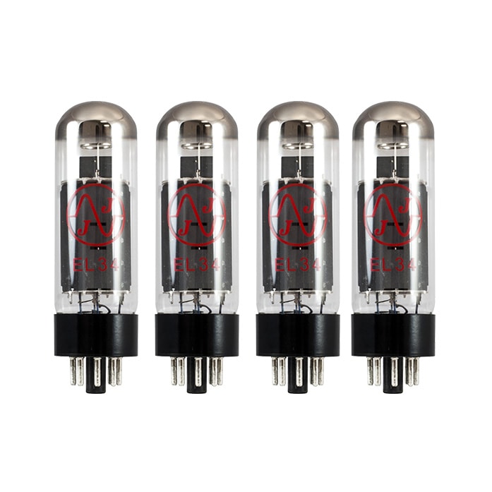 Four clear glass vacuum tubes with black bases and red markings standing upright in a row.