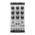 Eurorack module with nine knobs, three toggle switches, and multiple audio jacks labeled for delay and feedback controls