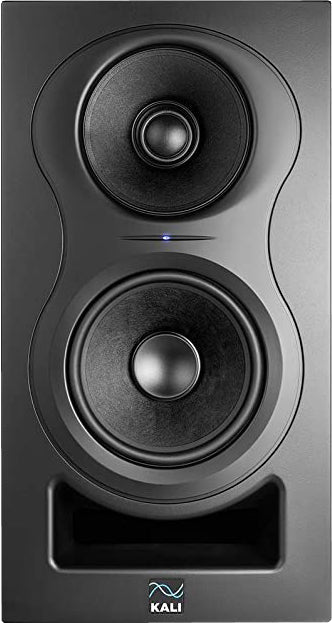 Front view of a black studio monitor speaker with two drivers and a bass port at the bottom