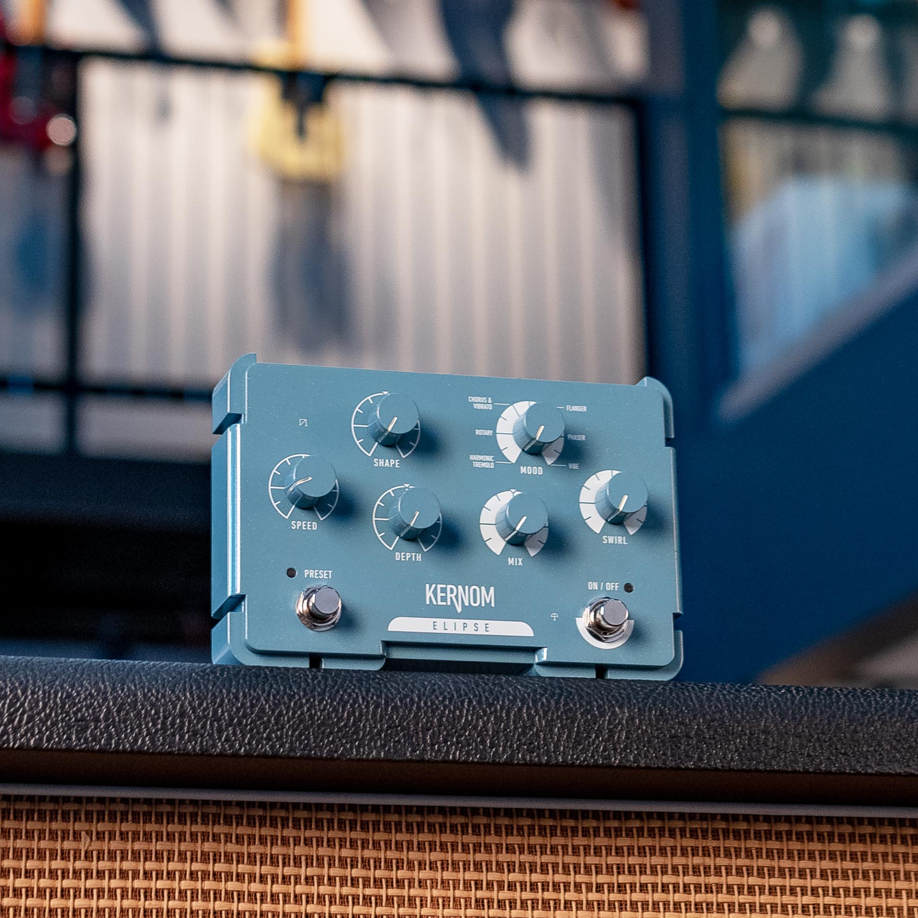 Blue KERNOM Elipse modulation pedal with six knobs and two footswitches on a textured surface.