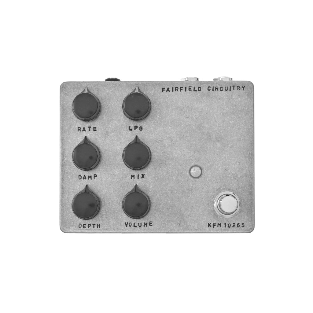 Gray metal guitar effects pedal with six control knobs, one footswitch, and two 1/4 inch audio jacks.