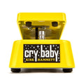 Yellow Dunlop Cry Baby wah pedal with Kirk Hammett signature on the front plate, pedal raised.